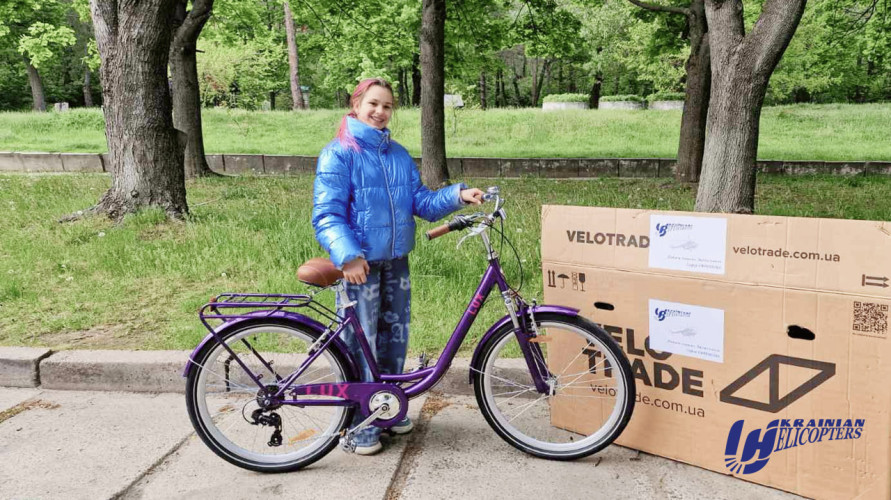 Thanks to the generosity of Ukrainian Helicopters, Sofia received her dream laptop and bicycle